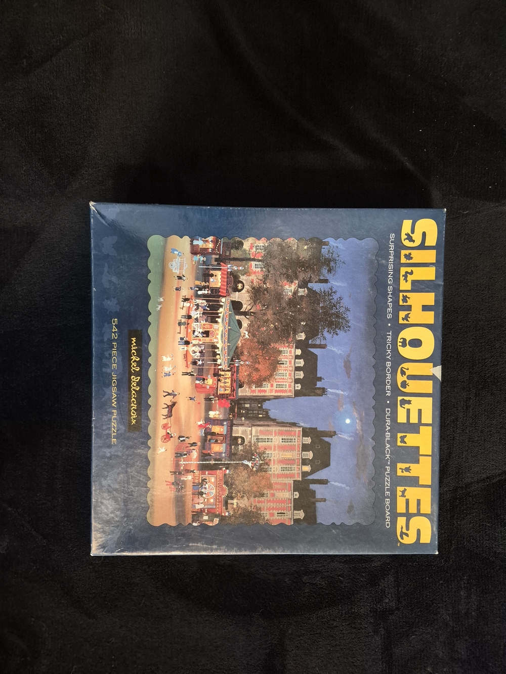 Silhouettes "Fête Foraine, Place des Vosges" 542 Piece Puzzle Michel Delacroix